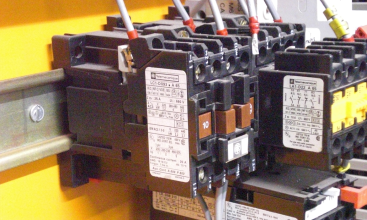 close up view of Telemecanique contactor mounted to DIN rail