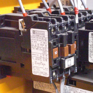 close up view of Telemecanique contactor mounted to DIN rail